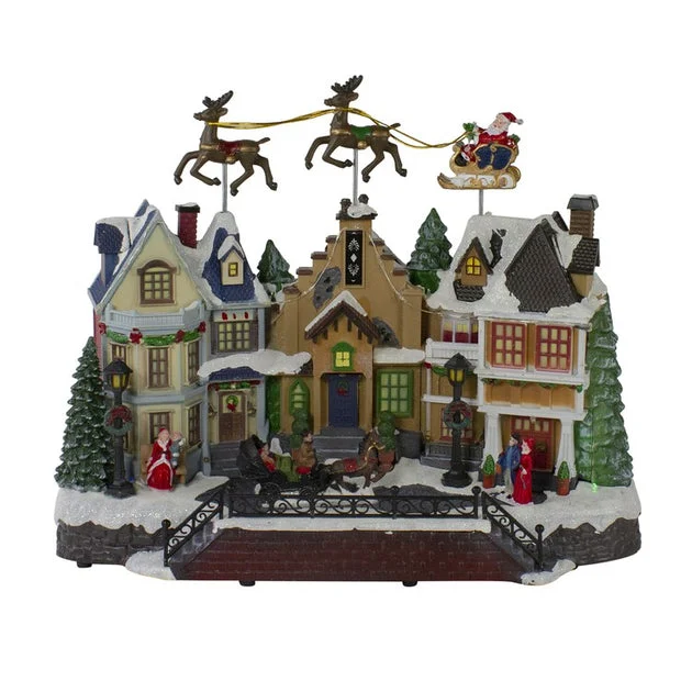 16" LED Lighted and Animated Christmas Village with Flying Sleigh Decoration